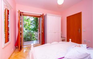 Postel nebo postele na pokoji v ubytování Holiday Home Prizba Bb