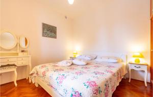 Postel nebo postele na pokoji v ubytování Holiday Home Prizba Bb