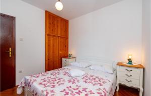Postel nebo postele na pokoji v ubytování Holiday Home Prizba Bb