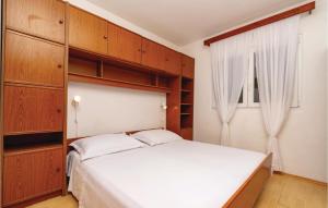 Posteľ alebo postele v izbe v ubytovaní Holiday Home Vinacac Bb Iii