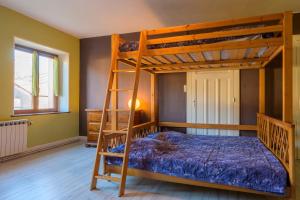 Posteľ alebo postele v izbe v ubytovaní Charmante Maison - Vosges