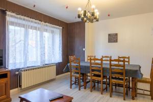Posedenie v ubytovaní Charmante Maison - Vosges