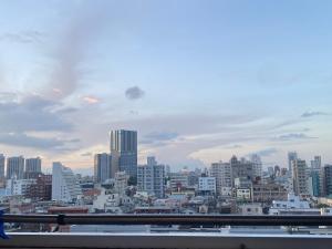 a view of a city with tall buildings at Shinjuku house 2 in Tokyo