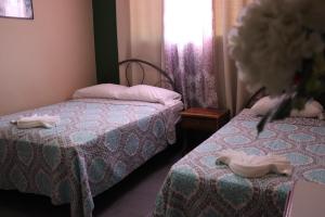 Krevet ili kreveti u jedinici u objektu Hotel Toledo