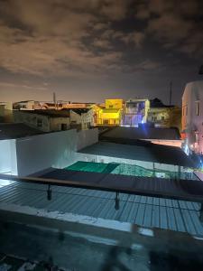 a view of the rooftop of a building at night at homestay SunMoon 14 Lê Lợi in Phan Thiet