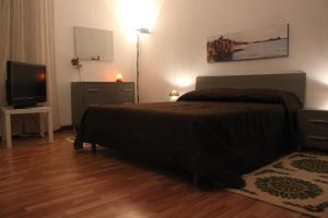 Postel nebo postele na pokoji v ubytování La Casetta