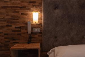 Postel nebo postele na pokoji v ubytování Hotel Ciamol