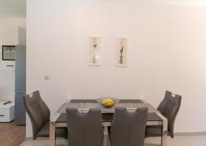 Kuchyň nebo kuchyňský kout v ubytování Apartments Srdanovic
