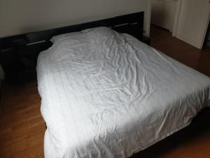 En eller flere senge i et værelse på Sur les toits du centre