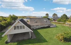 an aerial view of a house with a yard at Three-Bedroom Holiday Home In Knebel in Knebel