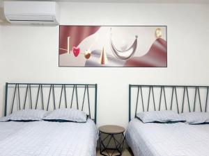 Katil atau katil-katil dalam bilik di HSH渋谷Hotel 电车三分钟可以到达新宿 幡ヶ谷 巴士直达涉谷 全新装修独栋小楼