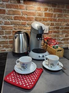 Kemudahan buat kopi dan teh di Apartman Lujzijana