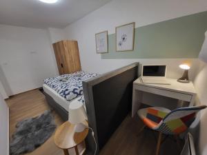 Katil atau katil-katil dalam bilik di Apartman Lujzijana