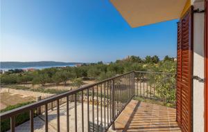 a balcony with a view of the ocean at Nice Apartment In Barbat With Wifi in Barbat na Rabu