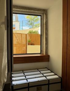 Ένα ή περισσότερα κρεβάτια σε δωμάτιο στο Birbantes 21