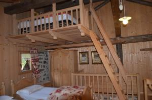 A bed or beds in a room at Baita Tomaselli
