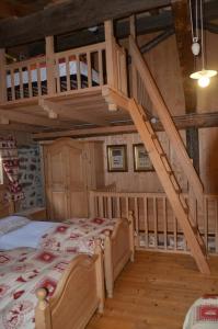A bed or beds in a room at Baita Tomaselli