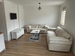 Posezení v ubytování Apartman Perla + 2 fotografie