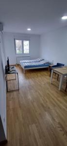 Postelja oz. postelje v sobi nastanitve Apartman KM24