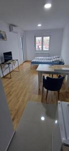 Predel za sedenje v nastanitvi Apartman KM24
