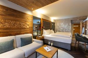 Ein Bett oder Betten in einem Zimmer der Unterkunft Hotel Innsbruck