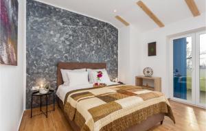 Posteľ alebo postele v izbe v ubytovaní Gorgeous Home In Dobrinj + 37 fotografií