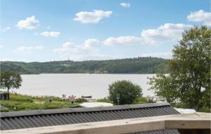 a view of a lake from a house at Awesome Home In Mariager With Wifi in Mariager