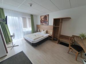 Ein Bett oder Betten in einem Zimmer der Unterkunft Fränkischer Hof --- Hotel in Pegnitz --- Schlabecks Fränkischer Hof