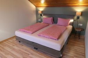 Postel nebo postele na pokoji v ubytování Haus Katris