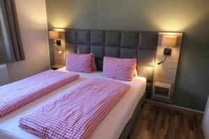 Postel nebo postele na pokoji v ubytování Haus Katris