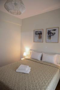 Cama o camas de una habitación en Joanna's Apartments