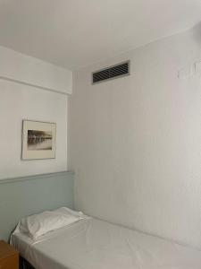 Postel nebo postele na pokoji v ubytování Fleming Center by Punta 25 Hotels Group
