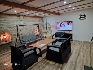 TV a/nebo společenská místnost v ubytování Apartman Matija