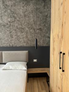 Postel nebo postele na pokoji v ubytování Center Boutique Hotel