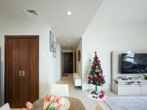 TV a/nebo společenská místnost v ubytování Upscale 2BR apartment with a complete view of the sea on Al Reem Island