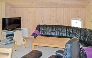 Μια τηλεόραση ή/και κέντρο ψυχαγωγίας στο Holiday Home Musvågevej Ix +7 φωτογραφίες