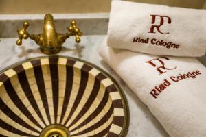 Certifikát, hodnocení, plakát nebo jiný dokument vystavený v ubytování Riad Cologne