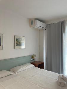 Postel nebo postele na pokoji v ubytování Fleming Center by Punta 25 Hotels Group
