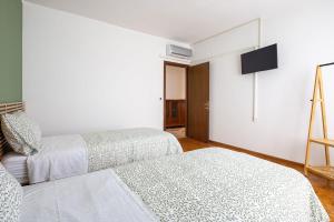 Postel nebo postele na pokoji v ubytování Casa Genny