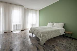 Postel nebo postele na pokoji v ubytování Casa Genny