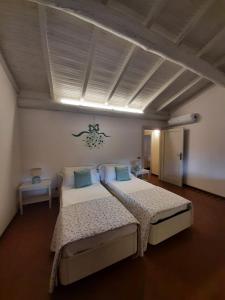 Katil atau katil-katil dalam bilik di Villa Gradoni