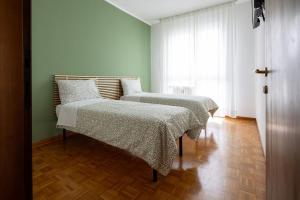 Postel nebo postele na pokoji v ubytování Casa Genny + 17 fotografií