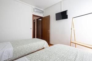 Postel nebo postele na pokoji v ubytování Casa Genny