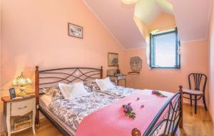Posteľ alebo postele v izbe v ubytovaní Holiday Home Gornji Tucepi 35