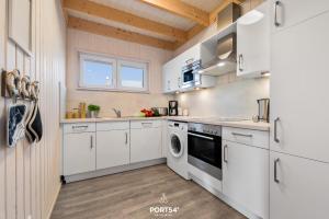 Kuchyň nebo kuchyňský kout v ubytování Ferienhaus Huus Luv
