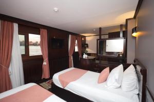 Voodi või voodid majutusasutuse YOU Nile View Hotel toas