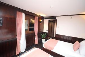 Voodi või voodid majutusasutuse YOU Nile View Hotel toas