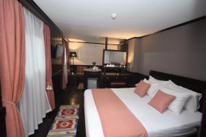 Voodi või voodid majutusasutuse YOU Nile View Hotel toas