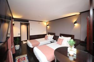 Voodi või voodid majutusasutuse YOU Nile View Hotel toas