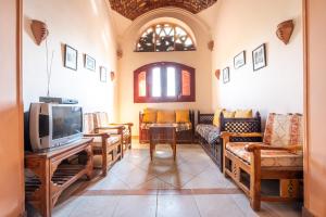 TV a/nebo společenská místnost v ubytování villa al diwan luxor